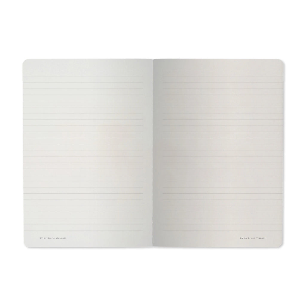 Open notebook with two blank pages on a white background