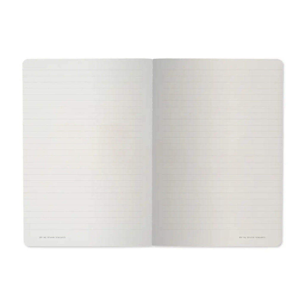 Open notebook with lined pages on a white background