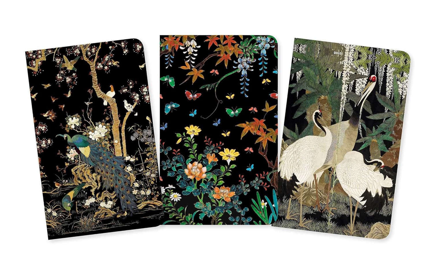 Three decorative notebooks with nature-themed designs on a white background