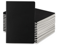 Stack of black notebooks on a white background