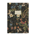 Notebook with floral design on a black background